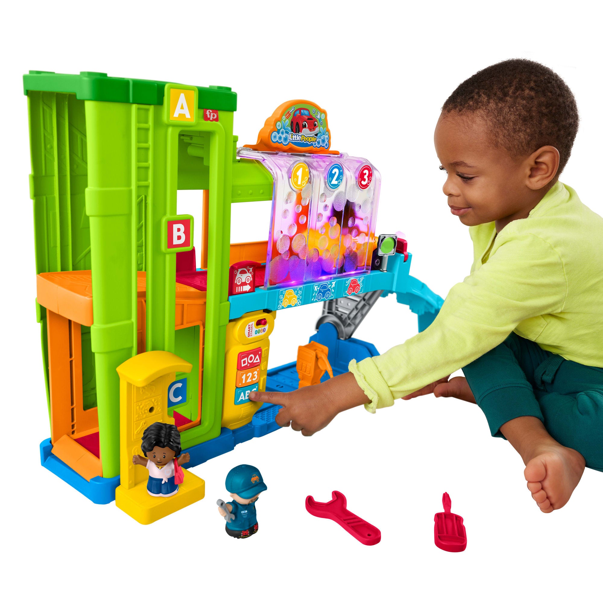 rzxbotqjtykg2ldapdnw_59014e08-dda1-4569-ba21-610e83fc9686 Fisher-Price Little People Light-Up Learning Garage Toddler Playset, 5 Play Pieces, Multi-Language Version - Image 1